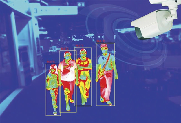 a infrared image of people walking : cctv security